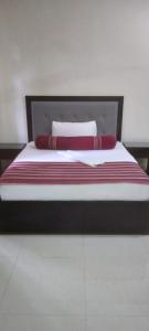 מיטה או מיטות בחדר ב-Nothern Residence