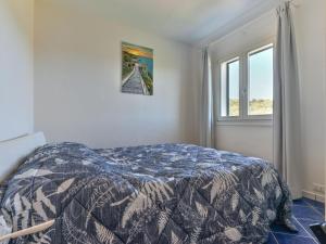 Ένα ή περισσότερα κρεβάτια σε δωμάτιο στο Apartment in Elba near Straccoligno Beach +8 φωτογραφίες