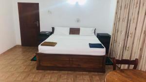Postel nebo postele na pokoji v ubytování Tamaro Beach Resort
