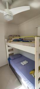 Poschodová posteľ alebo postele v izbe v ubytovaní Apartamento bambu Laranjeiras
