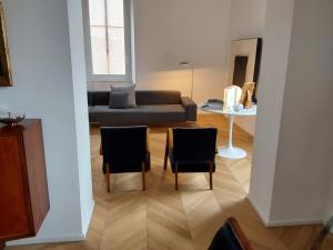 Area soggiorno di LESS IS MORE
