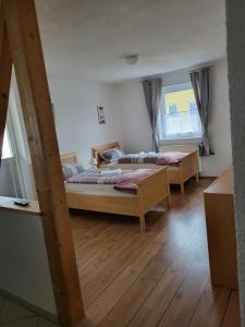 Postel nebo postele na pokoji v ubytování Böbrach Ferienwohnung