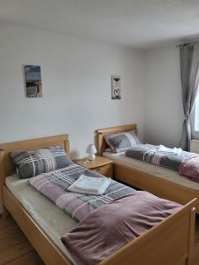 Postel nebo postele na pokoji v ubytování Böbrach Ferienwohnung