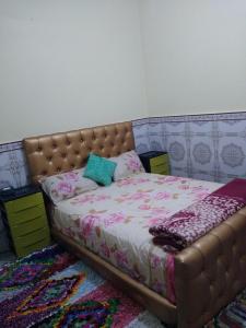 Giường trong phòng chung tại Casa Di Medina