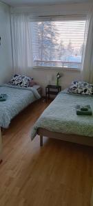 Postel nebo postele na pokoji v ubytování Villa Vanamo