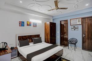 Llit o llits en una habitació de Collection O Kanchan Heritage