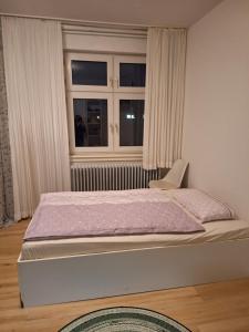 Postel nebo postele na pokoji v ubytování Gartenblick
