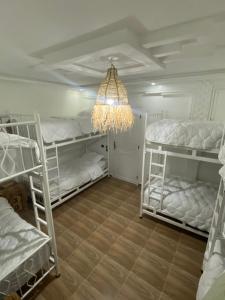Postel nebo postele na pokoji v ubytování Hostel Aftas Taghazout