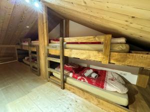 Ein Bett oder Betten in einem Zimmer der Unterkunft Chalet Victorine, vue imprenable avec spa