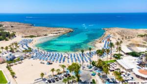 an aerial view of a beach and the ocean at Nissi Elena -Sunshine Apt in Ayia Napa