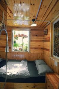 Postel nebo postele na pokoji v ubytování Ziczac Homestay Đà Lạt
