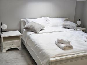 Postel nebo postele na pokoji v ubytování 4You Apartment