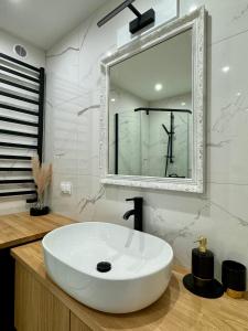 Ένα μπάνιο στο Apartamenty Kowalska III