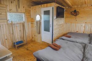 Postel nebo postele na pokoji v ubytování Ziczac Homestay Đà Lạt