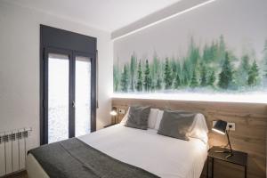 Voodi või voodid majutusasutuse Glaner Hotel Cafe toas