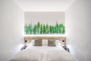 Voodi või voodid majutusasutuse Glaner Hotel Cafe toas