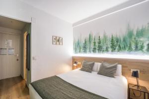 Voodi või voodid majutusasutuse Glaner Hotel Cafe toas