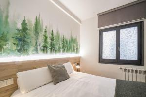 Voodi või voodid majutusasutuse Glaner Hotel Cafe toas