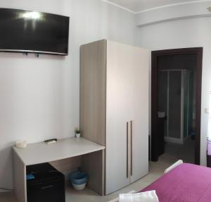 TV a/nebo společenská místnost v ubytování Guest House Elettra