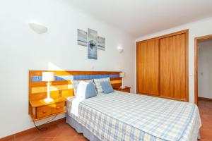 Ένα ή περισσότερα κρεβάτια σε δωμάτιο στο Quinta do Morgado By ALGARTUR +44 φωτογραφίες