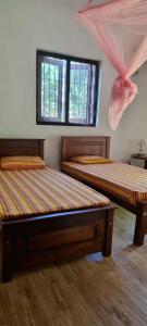 Krevet ili kreveti u jedinici u objektu Nature love Negombo