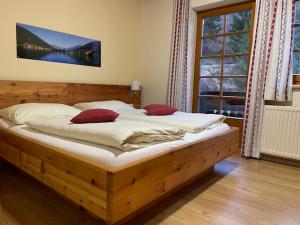Postel nebo postele na pokoji v ubytování Gasthof Thurnerhof