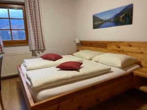 Postel nebo postele na pokoji v ubytování Gasthof Thurnerhof