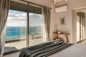 Posteľ alebo postele v izbe v ubytovaní My Villa Kefalonia Lourdas Beach