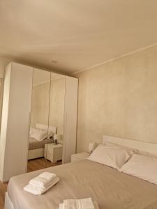 Ένα ή περισσότερα κρεβάτια σε δωμάτιο στο La casa di Orso