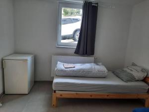 Postel nebo postele na pokoji v ubytování Flat Bangoua
