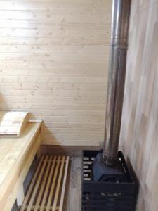 een sauna met een fornuis bij Hotel sauna in Poti