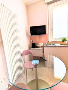โทรทัศน์และ/หรือระบบความบันเทิงของ Maison del Ducato Suite Parmigianino