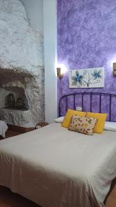 Posteľ alebo postele v izbe v ubytovaní Casas Rurales Maribel - Complejo Alcalá del Júcar