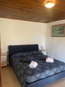 Postel nebo postele na pokoji v ubytování Da nonna Assunta