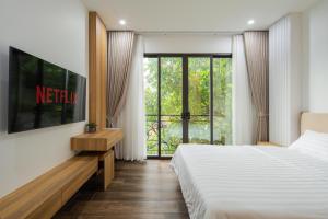 Postel nebo postele na pokoji v ubytování Studio-Vincent Apartment HaNoi