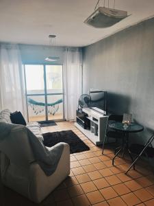 Svetainės erdvė apgyvendinimo įstaigoje Apartamento Beira-mar