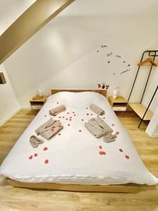 Posteľ alebo postele v izbe v ubytovaní L’appartement du Fayé avec jacuzzi privé