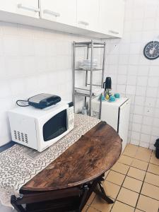 Virtuvė arba virtuvėlė apgyvendinimo įstaigoje Apartamento Beira-mar