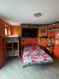 Posteľ alebo postele v izbe v ubytovaní Casa Vacanza Relax&Barbecue Sondrio