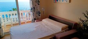 En eller flere senge i et værelse på ESTUDIO DELANTE DEL MAR