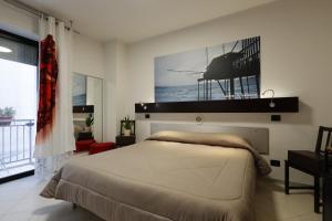Postel nebo postele na pokoji v ubytování Bella Pescara B&B + 37 fotografií