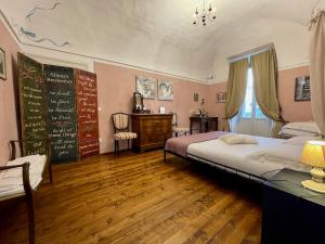 Posteľ alebo postele v izbe v ubytovaní Cascina Vicentini