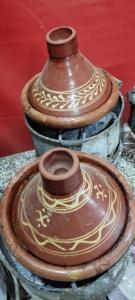 a group of vases sitting on top of a table at Ketama hachiche in Tlata Ketama