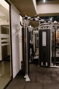 a room with a gym with a treadmill at Exclusivo, lujoso y nuevo apartamento en zona 10 in Guatemala