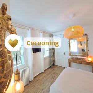 Ένα ή περισσότερα κρεβάτια σε δωμάτιο στο Chambre deluxe Olivièr et Pinedo