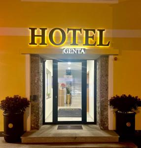 a hotel sign on the front of a building at Hotel Genta in Salzburg