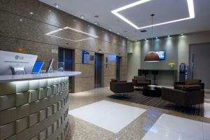 The lobby or reception area at Flat 609 - Comfort Hotel Taguatinga