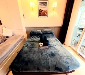 Voodi või voodid majutusasutuse Skyline suite 2 toas