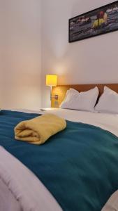 Ένα ή περισσότερα κρεβάτια σε δωμάτιο στο Jafar Resort 11 Penthouse