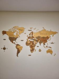 a map of the world on a wall at apartment Lavra beach in Lavra